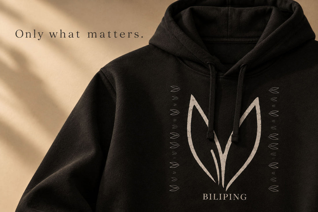 Close-up of a black Biliping hoodie with a rabbit motif on the chest and the words “Only what matters” beside it.