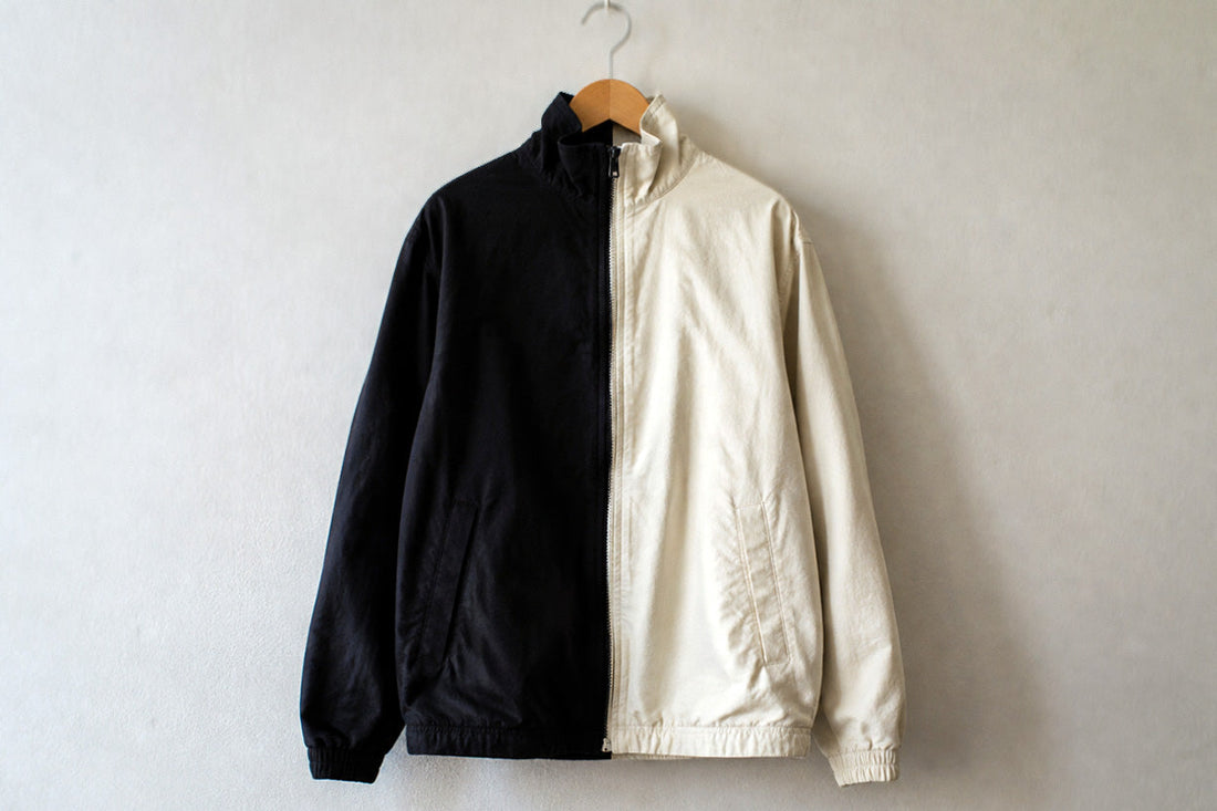 Split zip-up jacket, black on one side and ivory on the other — Biliping monochrome autumn edit